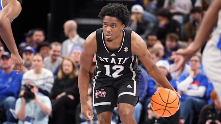 Dec 21, 2024; Memphis, Tennessee, USA; Mississippi State Bulldogs guard Josh Hubbard (12) dribbles the ball against the Memphis Tigers during the second half at FedExForum. Mandatory Credit: Wesley Hale-Imagn Images