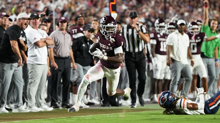 Aug 30, 2025; College Station, Texas, USA; Texas A&M Aggies wide receiver Mario Craver (1) running with the football in the second half against the UTSA Roadrunners at Kyle Field. Mandatory Credit: Sean Thomas-Imagn Images