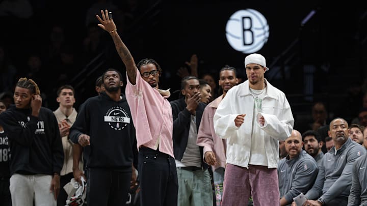Apr 5, 2026; Brooklyn, New York, USA; Brooklyn Nets center Nic Claxton (33), left, and forward Michael Porter Jr. (17) celebrate after a Nets basket during the second half against the Washington Wizards at Barclays Center. Mandatory Credit: Vincent Carchietta-Imagn Images