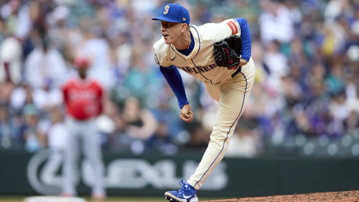Sep 14, 2025; Seattle, Washington, USA; Seattle Mariners pitcher Casey Legumina (64) throws against the Los Angeles Angels during the ninth inning at T-Mobile Park. Mandatory Credit: John Froschauer-Imagn Images
