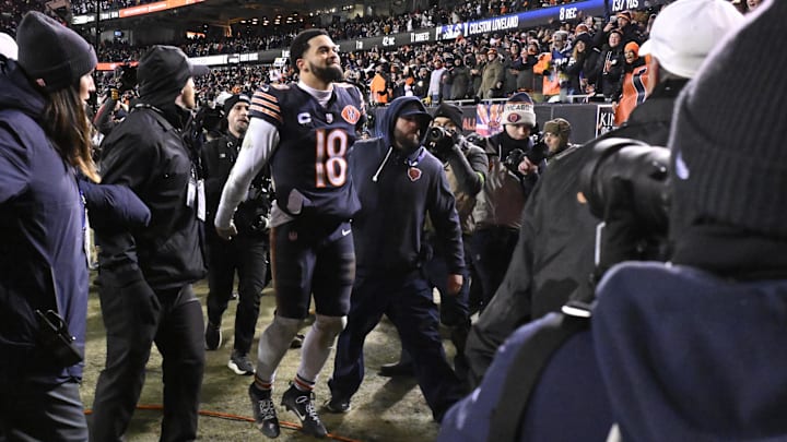 Caleb Williams basks in the moment as he leaves the field following the 31-27 win over Green Bay.
