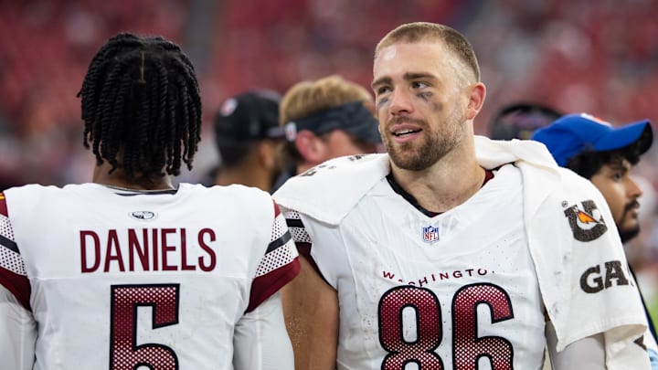 Sep 29, 2024; Glendale, Arizona, USA; Washington Commanders tight end Zach Ertz (86) with quarterback Jayden Daniels (5) against the Arizona Cardinals at State Farm Stadium. Mandatory Credit: Mark J. Rebilas-Imagn Images Sep 29, 2024; Glendale, Arizona, USA; Washington Commanders tight end Zach Ertz (86) with quarterback Jayden Daniels (5) against the Arizona Cardinals at State Farm Stadium. Mandatory Credit: Mark J. Rebilas-Imagn Images