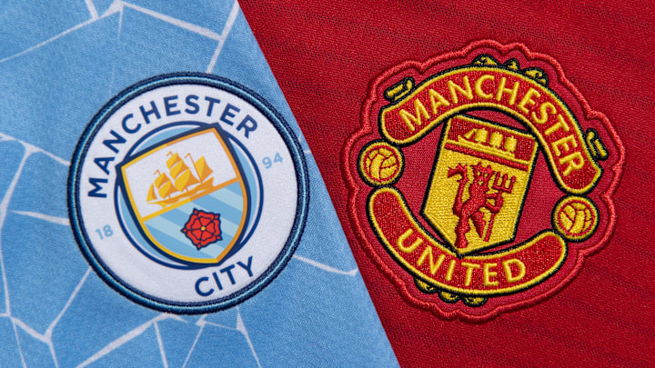 The Manchester City and Manchester United Club Badges