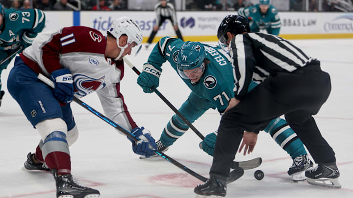 Nov 1, 2025; San Jose, California, USA; Colorado Avalanche center Brock Nelson (11) takes a faceoff against San Jose Sharks center Macklin Celebrini (71) during the first period at SAP Center at San Jose. Mandatory Credit: Dennis Lee-Imagn Images