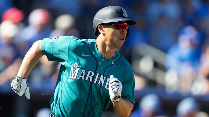 Feb 25, 2026; Surprise, Arizona, USA; Seattle Mariners outfielder Rob Refsnyder against the Kansas City Royals during a spring training game at Surprise Stadium. Mandatory Credit: Mark J. Rebilas-Imagn Images