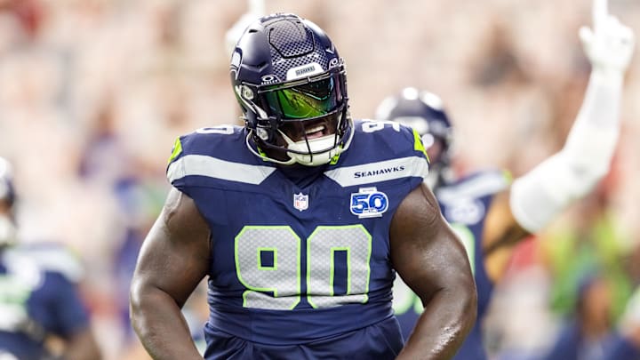 Sep 25, 2025; Glendale, Arizona, USA; Seattle Seahawks tackle Jarran Reed (90) reacts against the Arizona Cardinals at State Farm Stadium. Sep 25, 2025; Glendale, Arizona, USA; Seattle Seahawks tackle Jarran Reed (90) reacts against the Arizona Cardinals at State Farm Stadium.