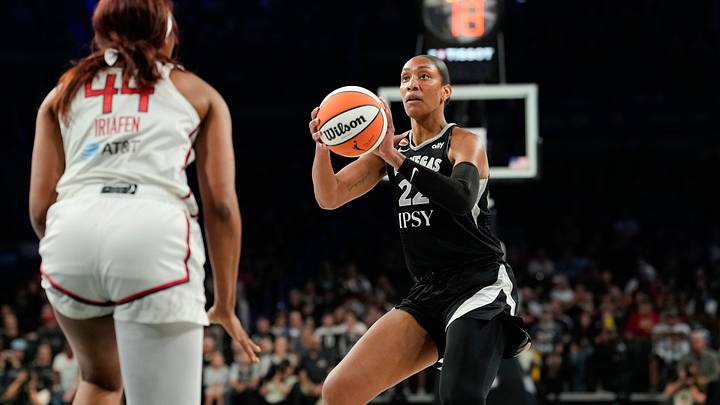 Aug 11, 2026; Las Vegas, Nevada, USA; Las Vegas Aces center A'ja Wilson (22) shoots the ball against Washington Mystics forward Kiki Iriafen (44) during the first quarter of a WNBA basketball game at Michelob Ultra Arena. Mandatory Credit: Lucas Peltier-Imagn Images