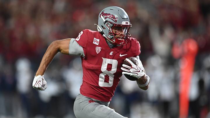 Washington State Cougars wide receiver Branden Ganashamoorthy (8) runs the ball in for a touchdown against the Arizona Wildcats during the second half at Gesa Field at Martin Stadium.
