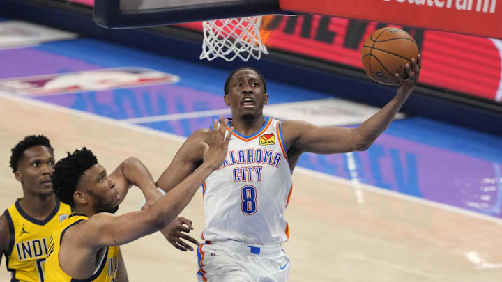Jun 16, 2025; Oklahoma City, Oklahoma, USA; Oklahoma City Thunder forward Jalen Williams (8) shoots a layup against Indiana Pacers center Tony Bradley (13) during the third quarter in Game 5 of the 2025 NBA Finals at Paycom Center. Mandatory Credit: Kyle Terada-Imagn Images Jun 16, 2025; Oklahoma City, Oklahoma, USA; Oklahoma City Thunder forward Jalen Williams (8) shoots a layup against Indiana Pacers center Tony Bradley (13) during the third quarter in Game 5 of the 2025 NBA Finals at Paycom Center. Mandatory Credit: Kyle Terada-Imagn Images