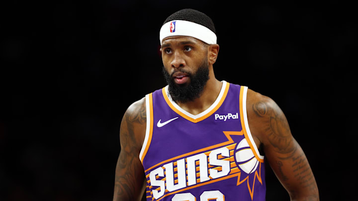 Dec 18, 2025; Phoenix, Arizona, USA; Phoenix Suns forward Royce O'Neale (00) against the Golden State Warriors at Mortgage Matchup Center. Mandatory Credit: Mark J. Rebilas-Imagn Images