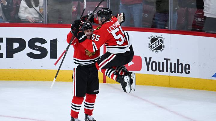 Oct 15, 2026; Chicago, Illinois, USA;  Chicago Blackhawks defenseman Artyom Levshunov (55) celebrates with right wing Patrick Kane (88) after he scores the game winning goal during the overtime period against the Winnipeg Jets at the United Center.  Mandatory Credit: Matt Marton-Imagn Images