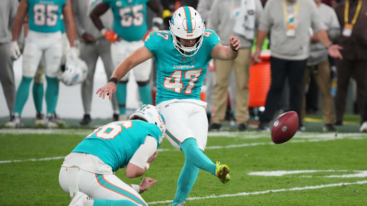 Miami Dolphins place kicker Riley Patterson (47) kicks a field goal against the Washington Commanders in overtime during the 2025 NFL Madrid Game at Santiago Bernabeu Stadium. 