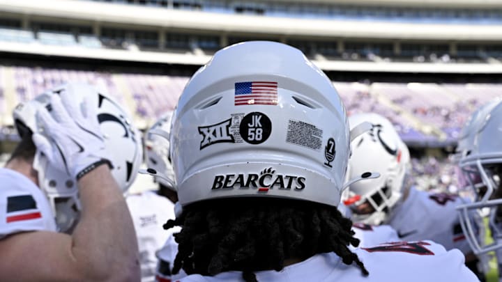 Nov 29, 2025; Fort Worth, Texas, USA; A view of the JK 58 decal on the back of the helmet of Cincinnati Bearcats defensive end Mikah Coleman (4) before the game at Amon G. Carter Stadium. Mandatory Credit: Jerome Miron-Imagn Images