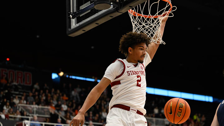Jan 11, 2025; Stanford, California, USA; Stanford Cardinal forward Donavin Young (2) dunks against the Virginia Cavaliers in the second half at Maples Pavilion. Mandatory Credit: Eakin Howard-Imagn Images