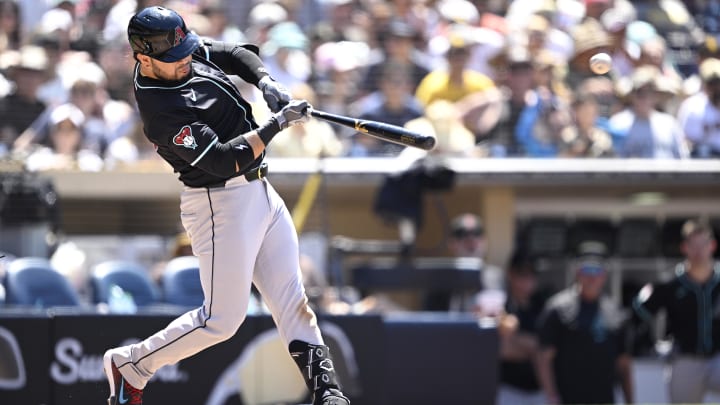 Jul 7, 2024; San Diego, California, USA; Arizona Diamondbacks third baseman Eugenio Suarez (28) hits a two-run home run against the San Diego Padres during the seventh inning at Petco Park. Mandatory Credit: Orlando Ramirez-USA TODAY Sports