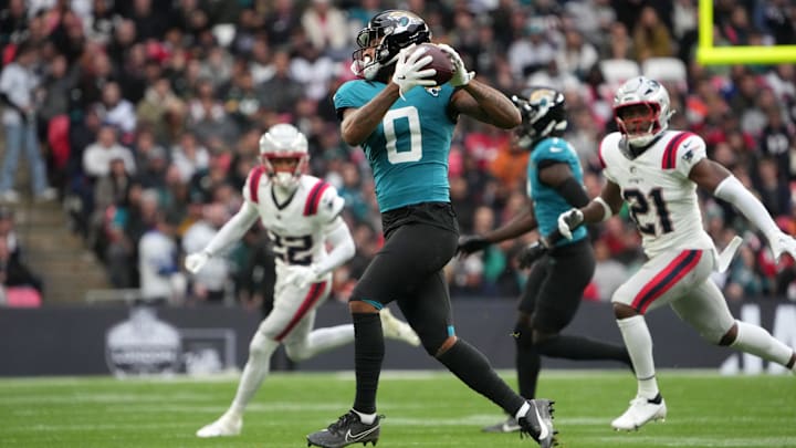 Oct 20, 2024; London, United Kingdom; Jacksonville Jaguars wide receiver Gabe Davis (0) catches the ball against the New England Patriots in the first half of an NFL International Series game at Wembley Stadium. Oct 20, 2024; London, United Kingdom; Jacksonville Jaguars wide receiver Gabe Davis (0) catches the ball against the New England Patriots in the first half of an NFL International Series game at Wembley Stadium.