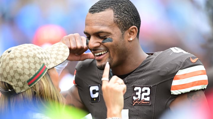 Cleveland Browns quarterback Deshaun Watson (4) greets his girlfriend Jilly Anais before the game between the Browns and the Tennessee Titans.