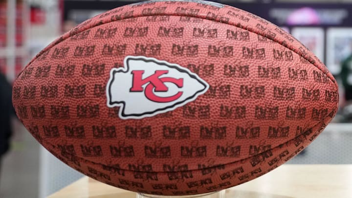 Feb 10, 2024; Las Vegas, NV, USA; Wilson footballs with the Kansas City Chiefs and San Francisco 49ers logos at the NFL Experience at the Mandalay Bay South Convention Center. Mandatory Credit: Kirby Lee-Imagn Images