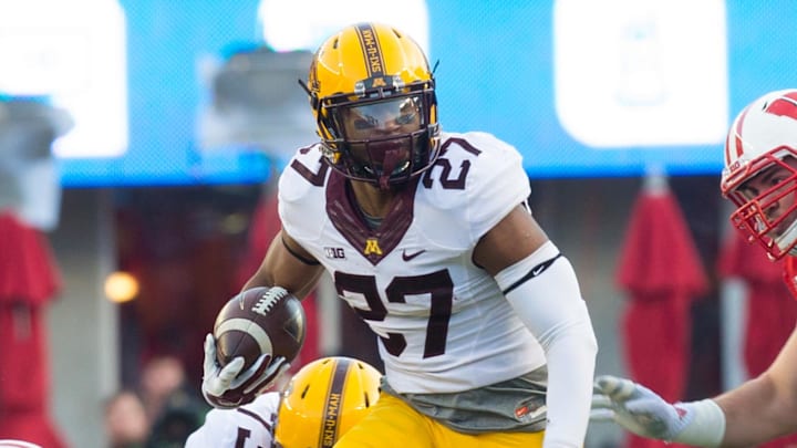 Nov 29, 2014; Madison, WI, USA; Minnesota Golden Gophers running back David Cobb (27) during the game against the Wisconsin Badgers at Camp Randall Stadium. Wisconsin won 34-24. Mandatory Credit: Jeff Hanisch-Imagn Images Nov 29, 2014; Madison, WI, USA; Minnesota Golden Gophers running back David Cobb (27) during the game against the Wisconsin Badgers at Camp Randall Stadium. Wisconsin won 34-24. Mandatory Credit: Jeff Hanisch-Imagn Images