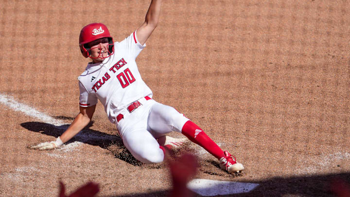 Texas Tech's Jackie Lis slides in for the game-winning run to complete the 10-9 comeback win over Ole Miss.