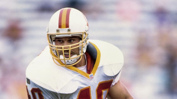 Tampa Bay Buccaneers running back Mike Alstott carries the ball against the Minnesota Vikings at Tampa Stadium.