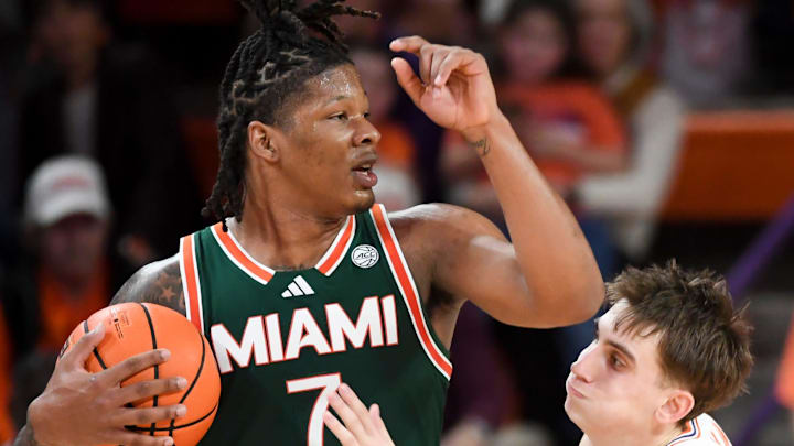 Clemson Tigers forward Jake Wahlin (10) attempts to steal the ball from Miami Hurricanes forward Shelton Henderson (7) Saturday, Jan. 17, 2026, during the NCAA men’s basketball game at Littlejohn Coliseum in Clemson, South Carolina. Clemson Tigers won 69-59.