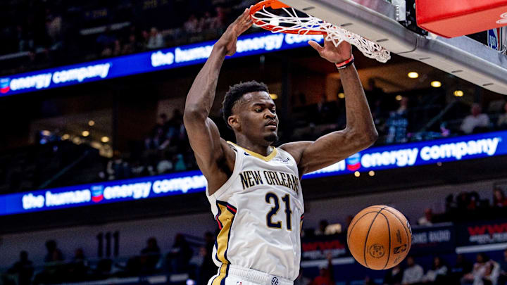 Apr 6, 2025; New Orleans, Louisiana, USA; New Orleans Pelicans center Yves Missi (21) dunks the ball against the Milwaukee Bucks during the second half at Smoothie King Center. Mandatory Credit: Stephen Lew-Imagn Images