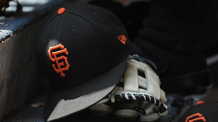 Jul 14, 2019; Milwaukee, WI, USA; San Francisco Giants hat and glove in the dug out at Miller Park.