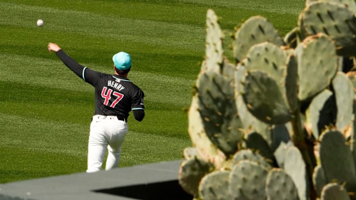 Arizona Diamondbacks starting pitcher Tommy Henry warms up before facing the Kansas City Royals during a spring training game at Salt River Fields in Scottsdale on March 14, 2024.