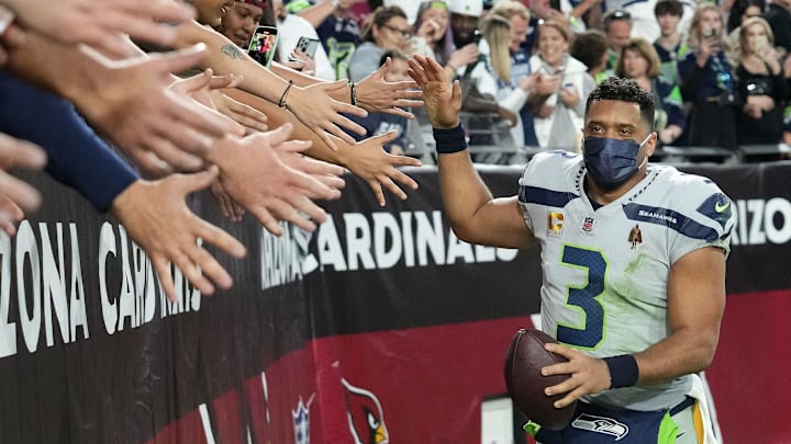 Jan 9, 2022; Glendale, Arizona, USA; Seattle Seahawks quarterback Russell Wilson (3) greets the fans after defeating the Arizona Cardinals at State Farm Stadium. Mandatory Credit: Rob Schumacher-Arizona Republic
Nfl Seattle Seahawks At Arizona Cardinals Jan 9, 2022; Glendale, Arizona, USA; Seattle Seahawks quarterback Russell Wilson (3) greets the fans after defeating the Arizona Cardinals at State Farm Stadium. Mandatory Credit: Rob Schumacher-Arizona Republic
Nfl Seattle Seahawks At Arizona Cardinals