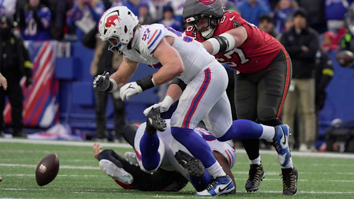 Buffalo Bills defensive end Joey Bosa tuns towards the fumble that Buffalo Bills defensive tackle DaQuan Jones caused after sacking Tampa Bay Buccaneers quarterback Baker Mayfield during second half action.