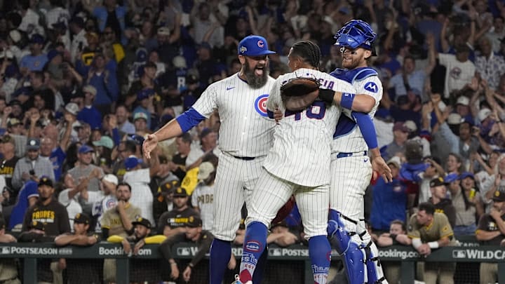 Oct 2, 2025; Chicago, Illinois, USA; Chicago Cubs relief pitcher Andrew Kittredge (59), relief pitcher Daniel Palencia (48) and catcher Carson Kelly (15) celebrate after defeating the San Diego Padres during game three of the Wildcard round for the 2025 MLB playoffs at Wrigley Field. Mandatory Credit: David Banks-Imagn Images Oct 2, 2025; Chicago, Illinois, USA; Chicago Cubs relief pitcher Andrew Kittredge (59), relief pitcher Daniel Palencia (48) and catcher Carson Kelly (15) celebrate after defeating the San Diego Padres during game three of the Wildcard round for the 2025 MLB playoffs at Wrigley Field. Mandatory Credit: David Banks-Imagn Images