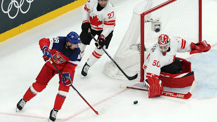 [US, Mexico & Canada customers only] Feb 12, 2026; Milan, Italy; Tomas Hertl of Czech Republic in action with Jordan Binnington and Shea Theodore of Canada  in a men's ice hockey Group A match during the Milano Cortina 2026 Olympic Winter Games at Milano Santagiulia Ice Hockey Arena. Mandatory Credit: Mike Segar/Reuters via Imagn Images