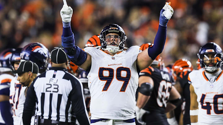 Dec 28, 2024; Cincinnati, Ohio, USA; Denver Broncos defensive end Zach Allen (99) reacts after a play against the Cincinnati Bengals in the second half at Paycor Stadium. Mandatory Credit: Katie Stratman-Imagn Images