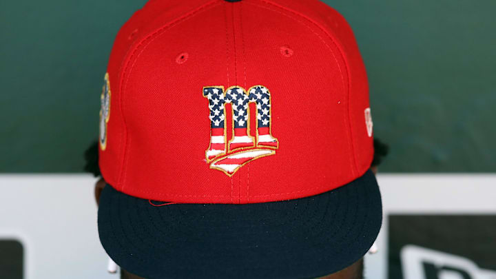 Jul 4, 2019; Oakland, CA, USA; Minnesota Twins players wear commemorative hats as seen before the game against the Oakland Athletics at Oakland Coliseum. Mandatory Credit: Darren Yamashita-Imagn Images