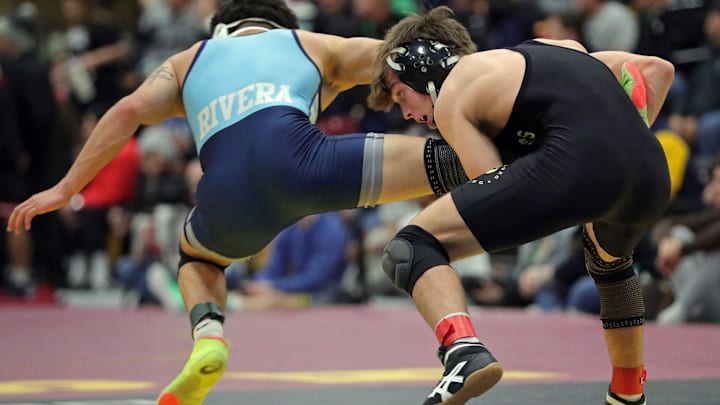 Marcus Blaze of Ohio's Perrysburg (right), the nation's top-ranked wrestler at 138, will lead his team at the Maumee Bay Tournament in Ohio this weekend.