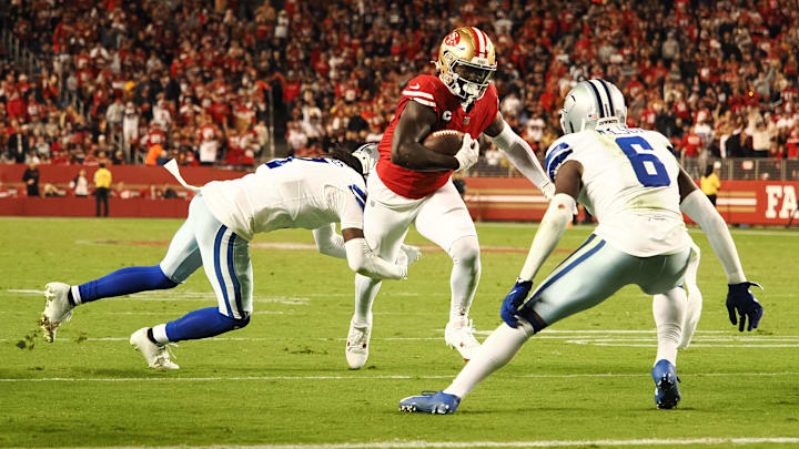 Oct 27, 2024; Santa Clara, California, USA; San Francisco 49ers wide receiver Deebo Samuel Sr (1) carries the ball against Dallas Cowboys cornerback Trevon Diggs (7) and safety Donovan Wilson (6) during the third quarter at Levi's Stadium. Mandatory Credit: Kelley L Cox-Imagn Images