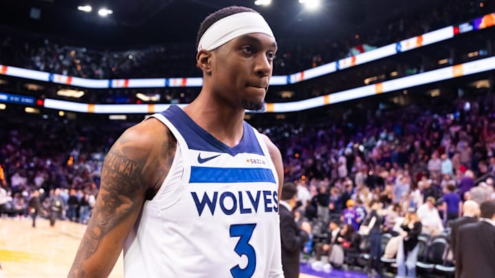 Jan 29, 2025; Phoenix, Arizona, USA; Minnesota Timberwolves forward Jaden McDaniels (3) against the Phoenix Suns at Footprint Center. Mandatory Credit: Mark J. Rebilas-Imagn Images
