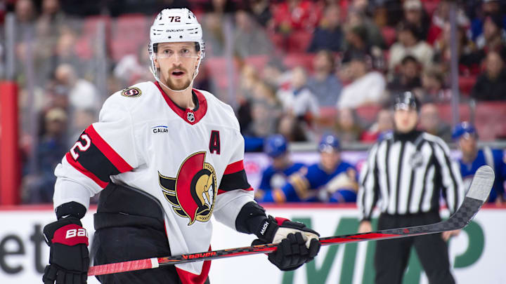Jan 9, 2025; Ottawa, Ontario, CAN; Ottawa Senators defenseman Thomas Chabot (72) gets in position for a faceoff in the first period against the Buffalo Sabres at the Canadian Tire Centre. Mandatory Credit: Marc DesRosiers-Imagn Images