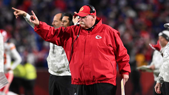 Nov 17, 2024; Orchard Park, New York, USA; Kansas City Chiefs head coach Andy Reid signals to go for one point after a touchdown  against the Buffalo Bills in the fourth quarter at Highmark Stadium. Mandatory Credit: Mark Konezny-Imagn Images