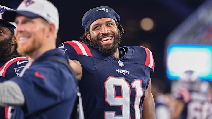 August 8, 2024; Foxborough, MA, USA;  New England Patriots defensive end Deatrich Wise Jr. (91) reacts on the sideline during the second half against the Carolina Panthers at Gillette Stadium. Mandatory Credit: Eric Canha-Imagn Images