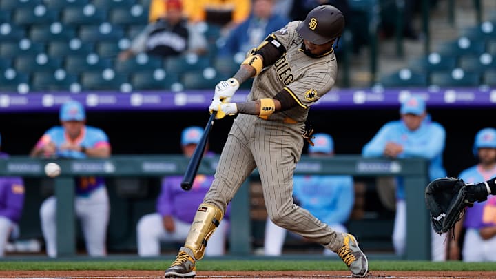 May 9, 2025; Denver, Colorado, USA; San Diego Padres first baseman Luis Arraez (4) hits a single in the first inning against the Colorado Rockies at Coors Field. Mandatory Credit: Isaiah J. Downing-Imagn Images May 9, 2025; Denver, Colorado, USA; San Diego Padres first baseman Luis Arraez (4) hits a single in the first inning against the Colorado Rockies at Coors Field. Mandatory Credit: Isaiah J. Downing-Imagn Images