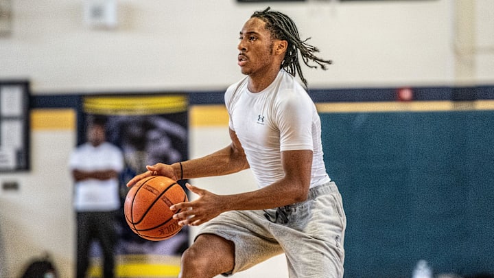 Wayne Memorial's Carlos Medlock Jr. looks to shoot during a boys basketball open gym on Wednesday, July 31, 2024.