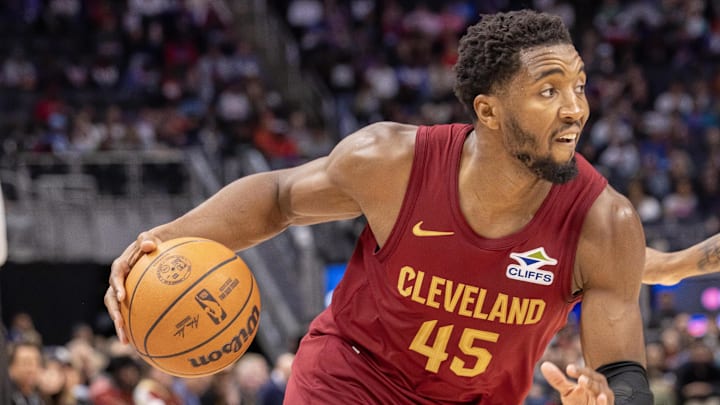 Oct 27, 2025; Detroit, Michigan, USA; Cleveland Cavaliers guard Donovan Mitchell (45) moves the ball up court against the Detroit Pistons during the second half at Little Caesars Arena. Mandatory Credit: David Reginek-Imagn Images