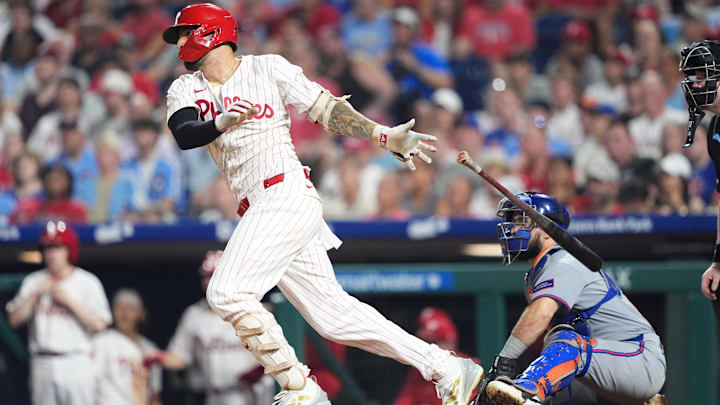 Jun 22, 2025; Philadelphia, Pennsylvania, USA; Philadelphia Phillies outfielder Nick Castellanos (8) hits an RBI double against the New York Mets in the seventh inning at Citizens Bank Park.