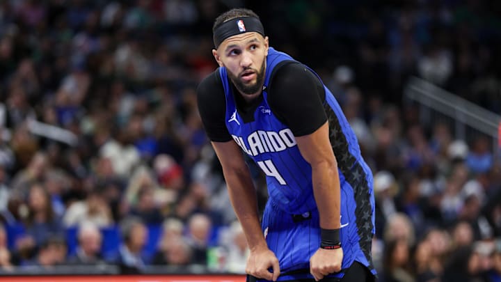 Dec 23, 2024; Orlando, Florida, USA; Orlando Magic guard Jalen Suggs (4) looks on against the Boston Celtics in the third quarter at Kia Center. Mandatory Credit: Nathan Ray Seebeck-Imagn Images