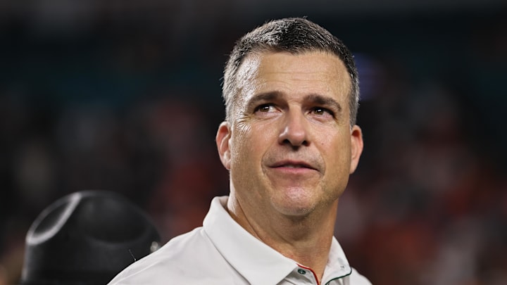 Oct 26, 2024; Miami Gardens, Florida, USA; Miami Hurricanes head coach Mario Cristobal looks on after the game against the Florida State Seminoles at Hard Rock Stadium. Mandatory Credit: Sam Navarro-Imagn Images
