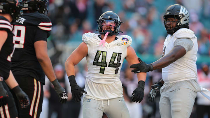 Jan 1, 2026; Miami Gardens, FL, USA; Oregon Ducks linebacker Teitum Tuioti (44) reacts after a sack against the Texas Tech Red Raiders during the second half of the 2025 Orange Bowl and quarterfinal game of the College Football Playoff at Hard Rock Stadium. Mandatory Credit: Sam Navarro-Imagn Images