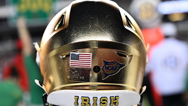 Aug 31, 2024; College Station, Texas, USA; A detailed view of Notre Dame Fighting Irish helmet on the sideline during the game against the Texas A&M Aggies at Kyle Field. Mandatory Credit: Maria Lysaker-Imagn Images