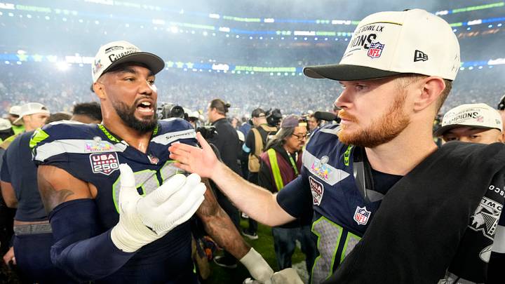 Feb 8, 2026; Santa Clara, CA, USA; Seattle Seahawks quarterback Sam Darnold (14) celebrates with defensive end Leonard Williams (99) after defeating the New England Patriots in Super Bowl LX at Levi's Stadium. Mandatory Credit: Kyle Terada-Imagn Images